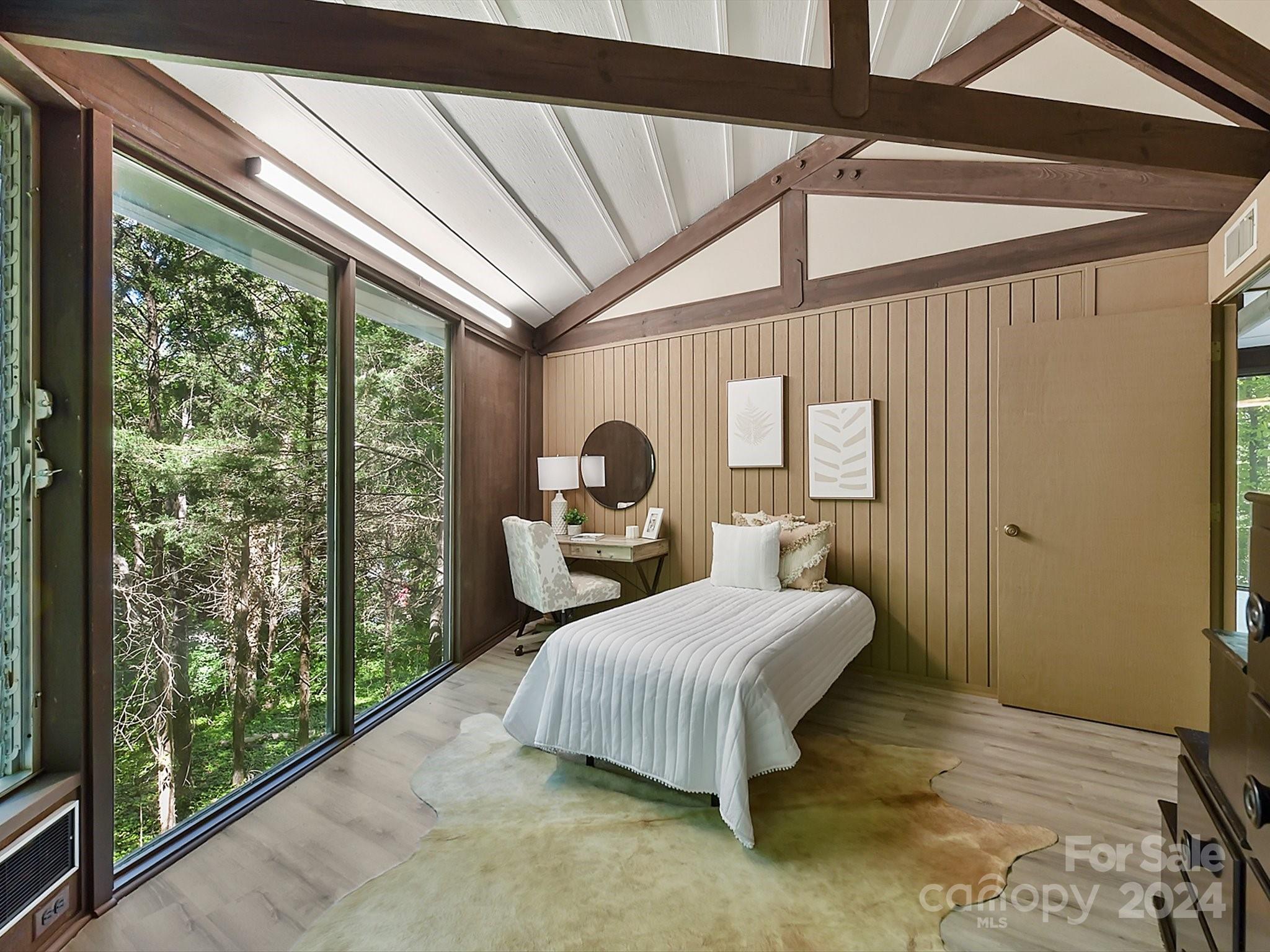 1665 Bowater Road Rock Hill, SC 29732 - Photo 18 of 43 a bedroom with a bed and wooden floor