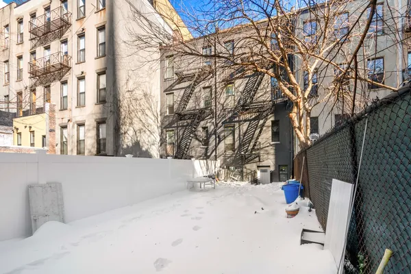 a view of roof and covered with snow