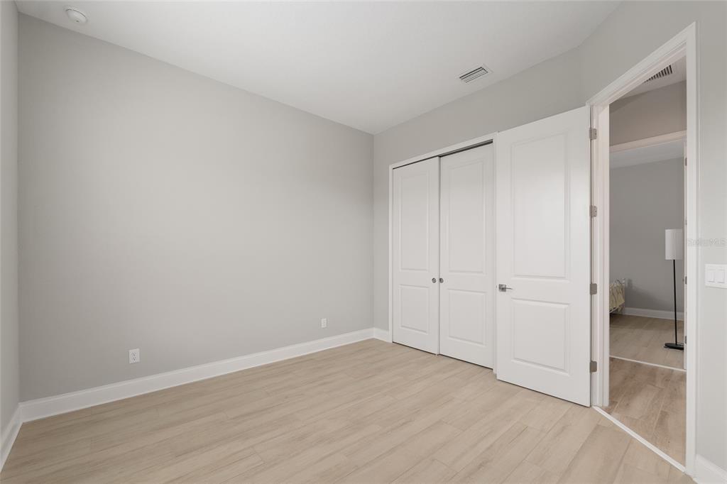 12048 Southwest 35th Place Gainesville, FL 32608 - Photo 25 of 53 a view of an empty room