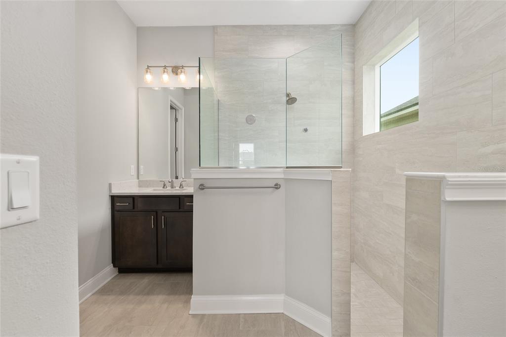 12048 Southwest 35th Place Gainesville, FL 32608 - Photo 30 of 53 view of kitchen with granite countertop cabinets and sink
