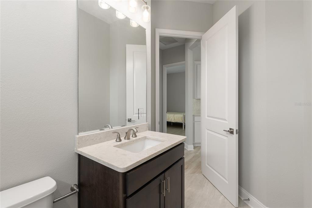 12048 Southwest 35th Place Gainesville, FL 32608 - Photo 36 of 53 a bathroom with a sink toilet and shower