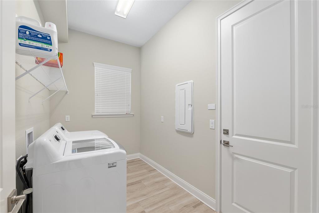 12048 Southwest 35th Place Gainesville, FL 32608 - Photo 37 of 53 a utility room with dryer and washer