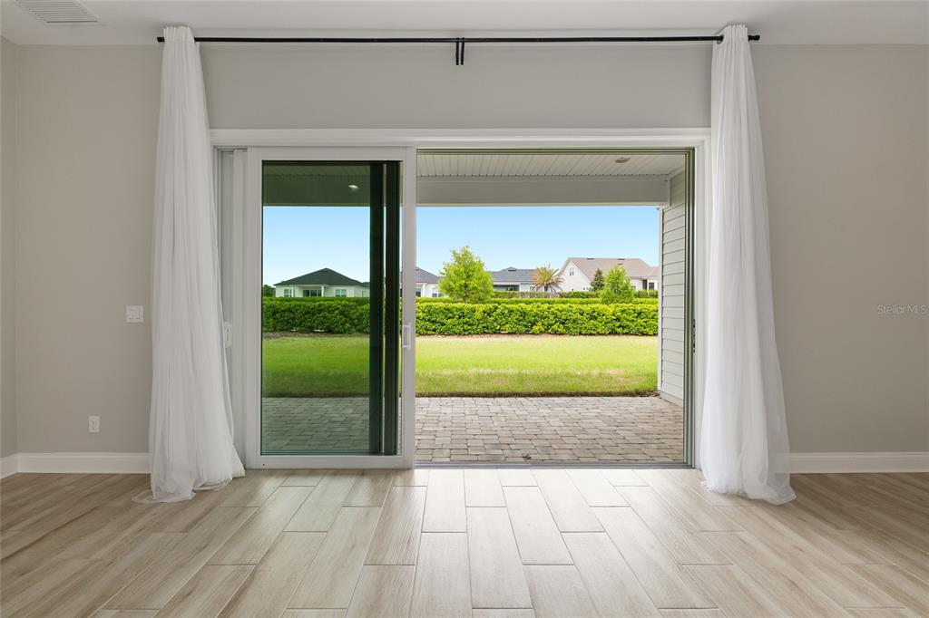 12048 Southwest 35th Place Gainesville, FL 32608 - Photo 39 of 53 a view of a room that has a large window and front door