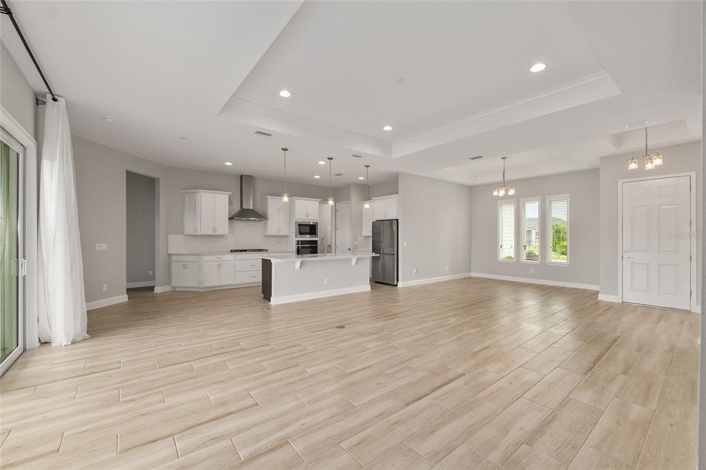 12048 Southwest 35th Place Gainesville, FL 32608 - Photo 9 of 53 a view of kitchen with refrigerator and window