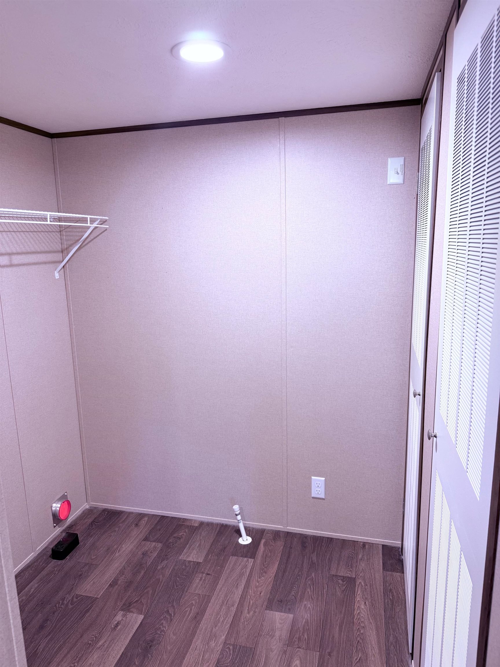 1252 Mallard Court Conway, SC 29526 - Photo 14 of 38 Laundry room featuring dark wood finished floors, a decorative wall, a heating unit, and recessed lighting
