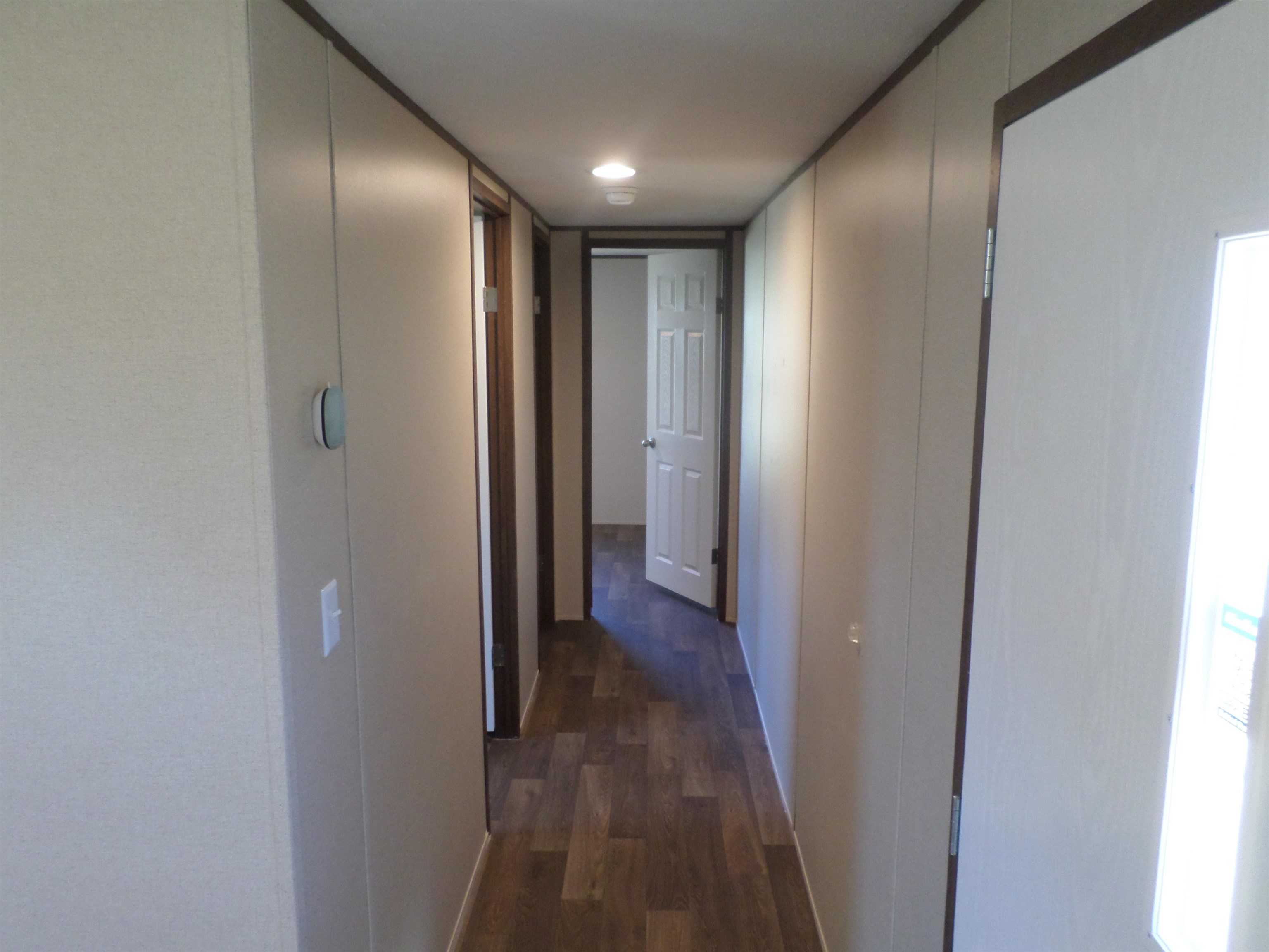 1252 Mallard Court Conway, SC 29526 - Photo 34 of 38 Corridor with dark wood-style floors and recessed lighting