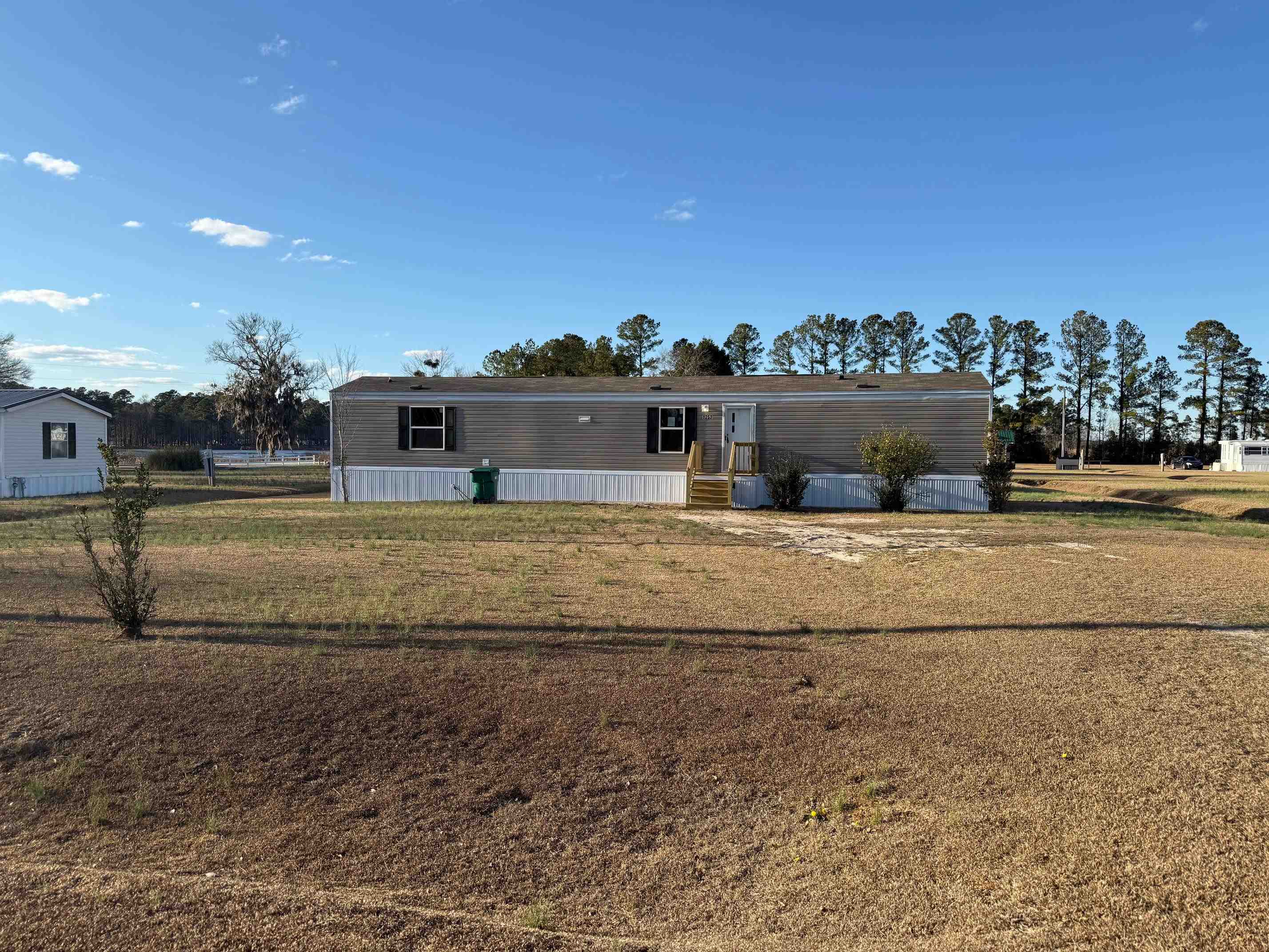 1252 Mallard Court Conway, SC 29526 - Photo 5 of 38 Manufactured / mobile home featuring a front lawn