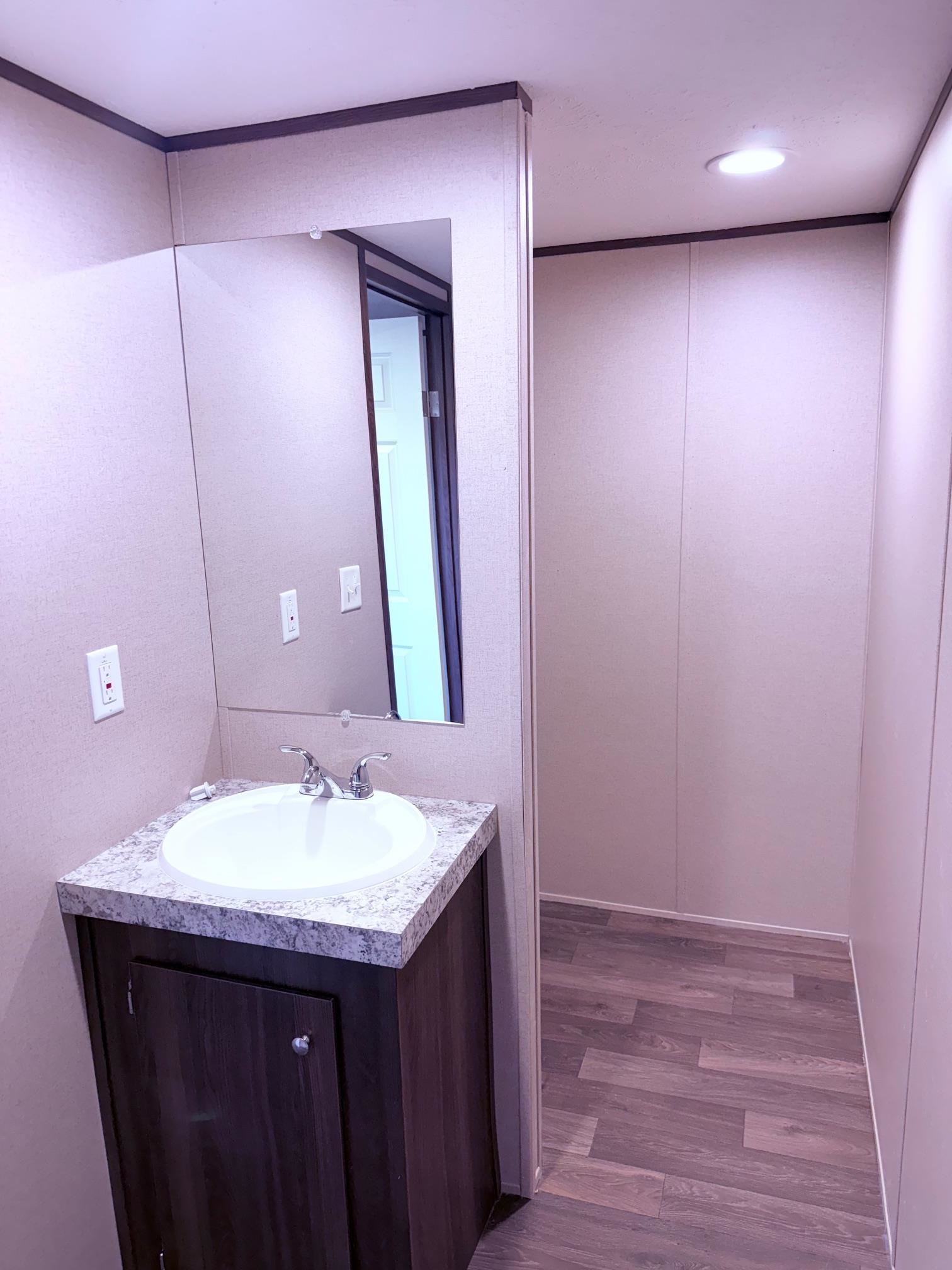 1252 Mallard Court Conway, SC 29526 - Photo 10 of 38 Bathroom featuring vanity and light wood-style flooring