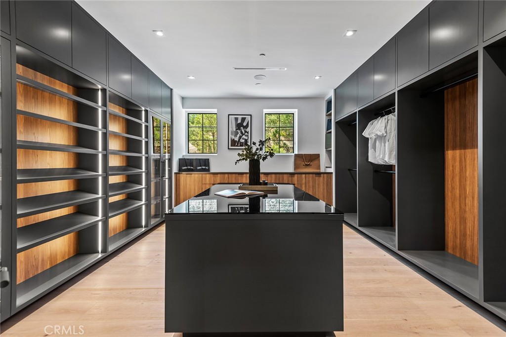 24044 Long Valley Road Hidden Hills, CA 91302 - Photo 30 of 57 a kitchen with stainless steel appliances granite countertop a sink and a refrigerator