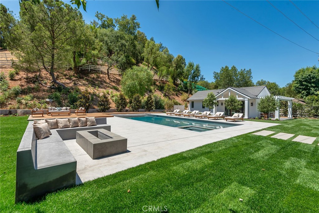 24044 Long Valley Road Hidden Hills, CA 91302 - Photo 47 of 57 a view of swimming pool with seating space