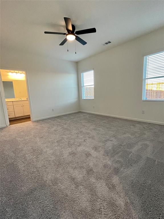 6222 Old Bridge Way Forney, TX 75126 - Photo 8 of 17 an empty room with a window