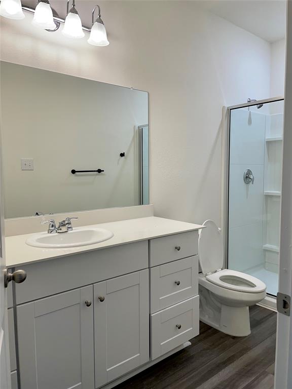 6222 Old Bridge Way Forney, TX 75126 - Photo 9 of 17 a bathroom with a sink toilet and shower