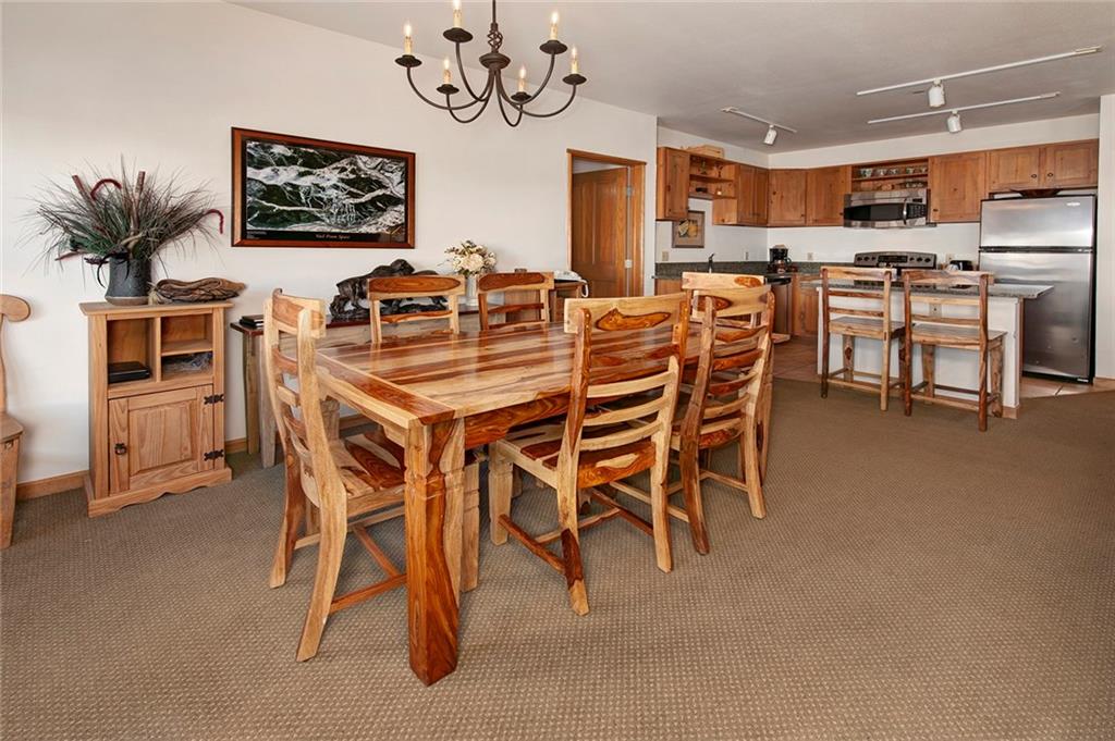 195 River Run Road, Unit 8017 Keystone, CO 80435 - Photo 6 of 32 a view of a dining room with furniture