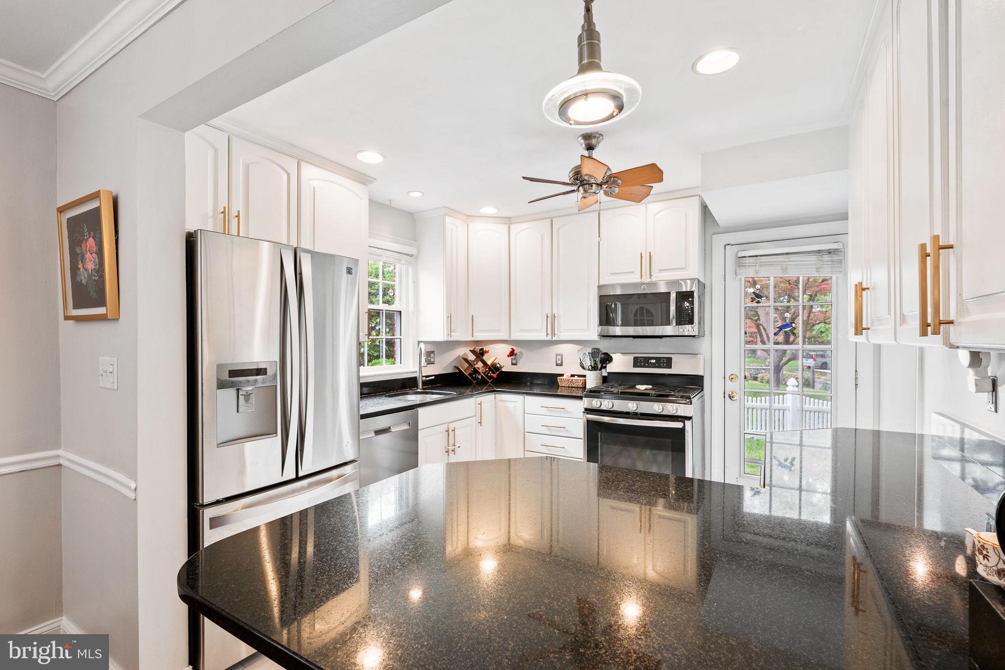 9200 Sudbury Road Silver Spring, MD 20901 - Photo 9 of 41 Kitchen with counter seating