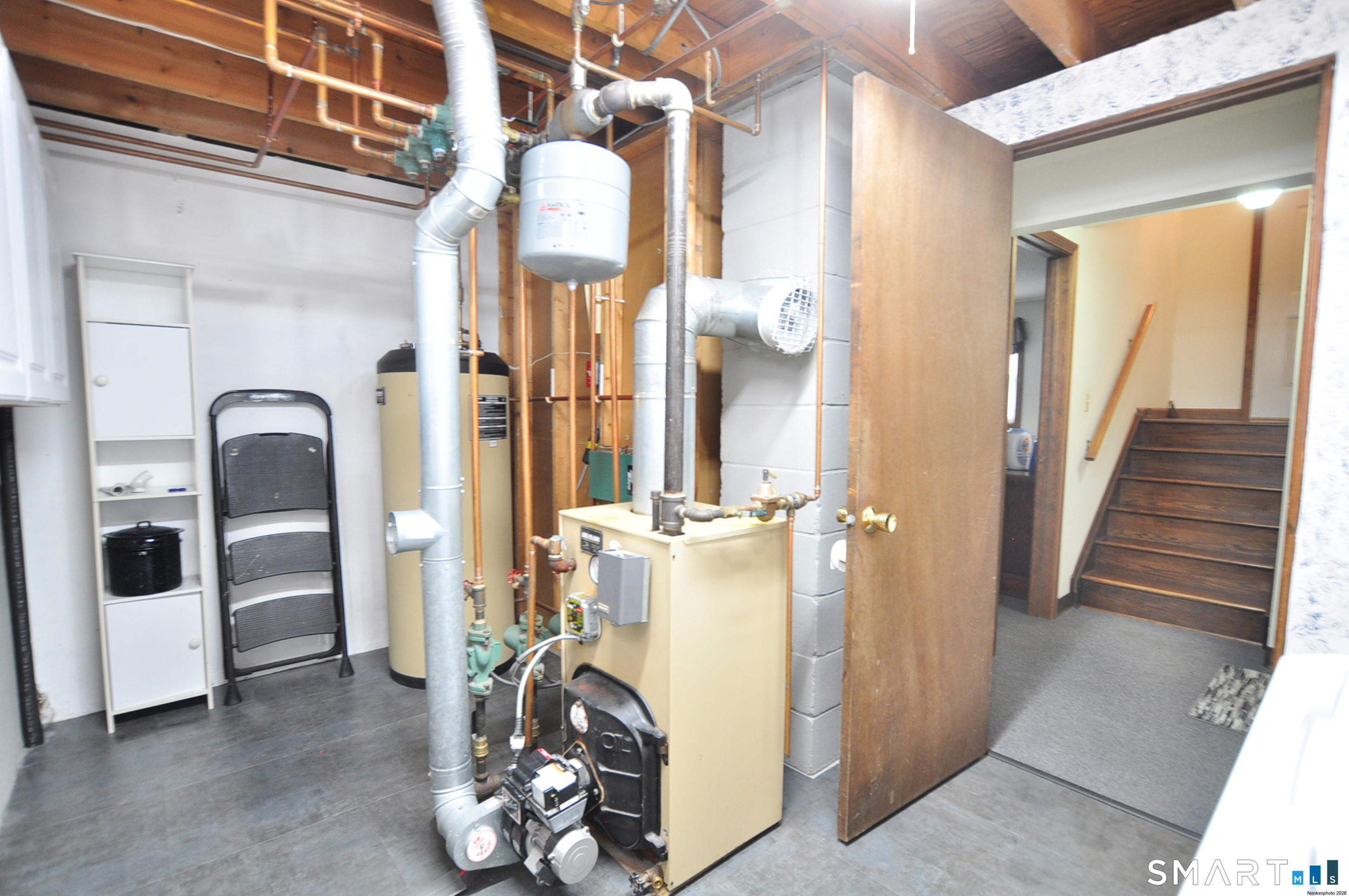 20 Lawrence Lane Torrington, CT 06790 - Photo 39 of 40 utilty room Well Maclain furnace and hotwater tank. Indirect fired water heater.