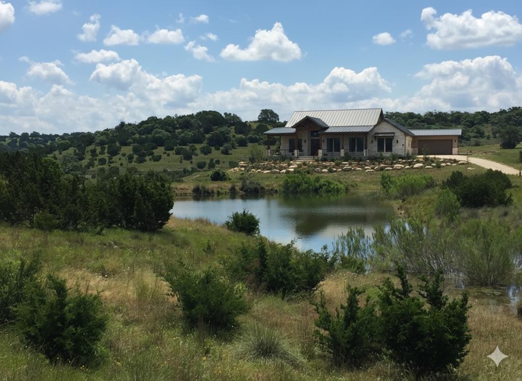 2 Sanctuary Lane, Unit 2 Blanco, TX 78606 - Photo 13 of 13 a view of a lake with houses