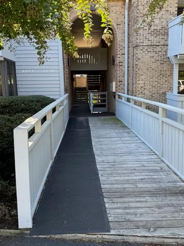 swimming pool view with balcony