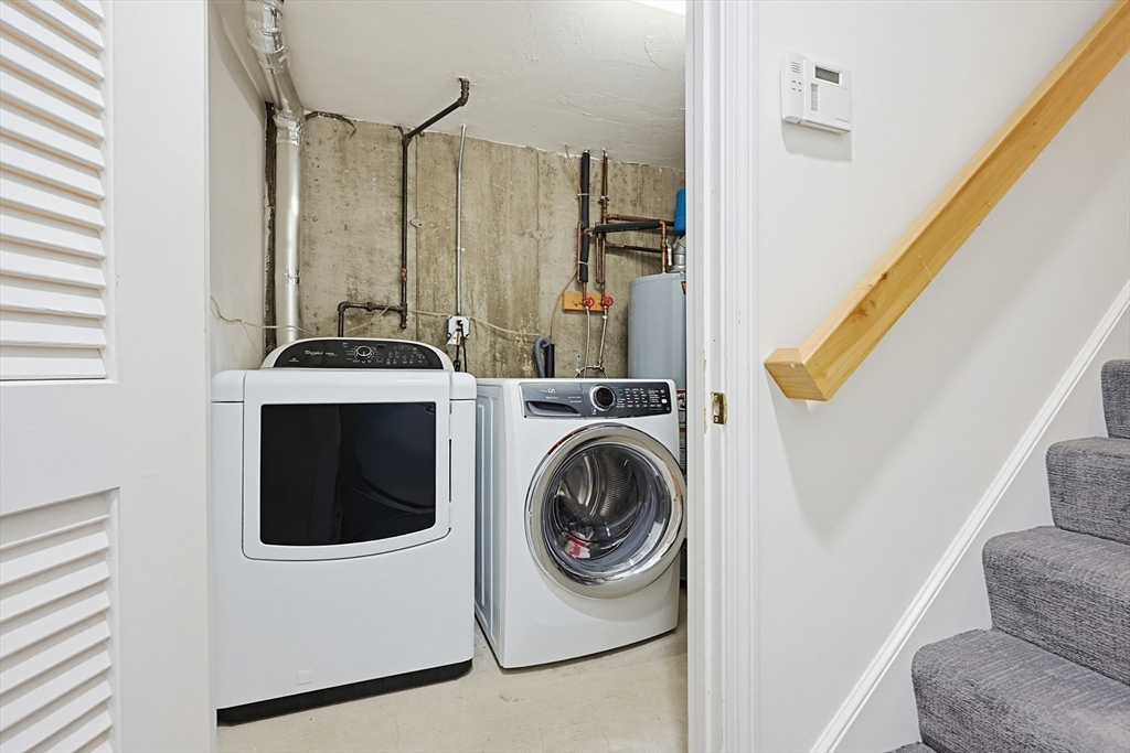 3002 Maple Brook Road, Unit 3002 Bellingham, MA 02019 - Photo 31 of 42 a utility room with dryer and washer
