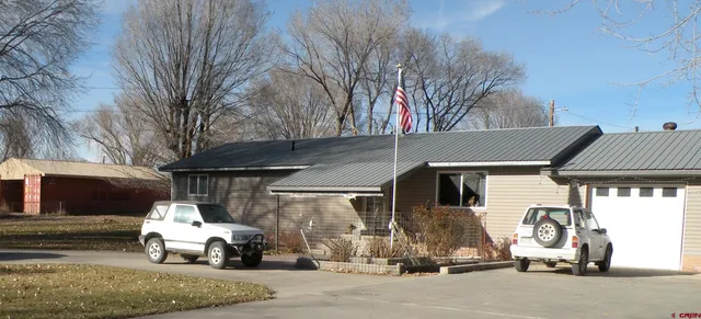 a car parked in front of a house