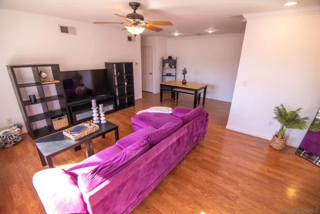 a bed room with a bed window and a chair