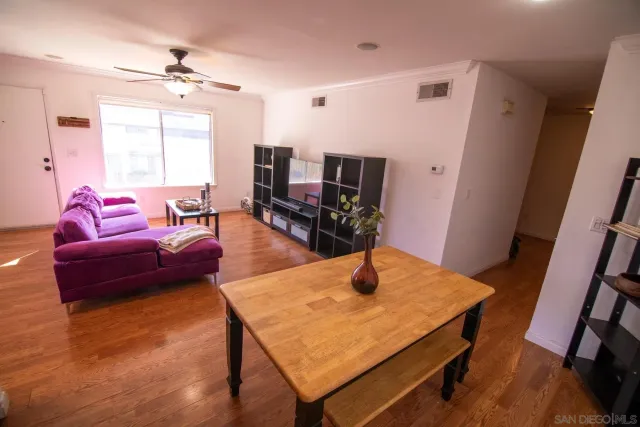 a living room with furniture and window