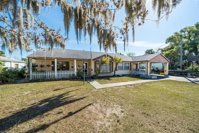 a front view of a house with swimming pool