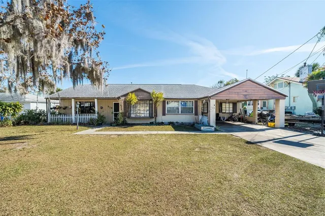 a front view of a house with swimming pool