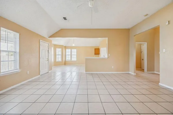 a view of an empty room with window
