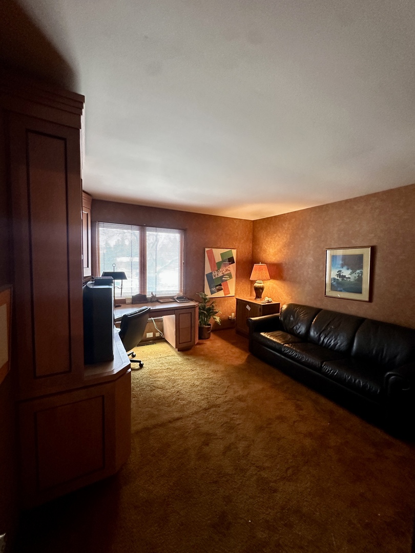 3008 Rennes Court Northbrook, IL 60062 - Photo 25 of 32 a living room with furniture hard wood floor and a window