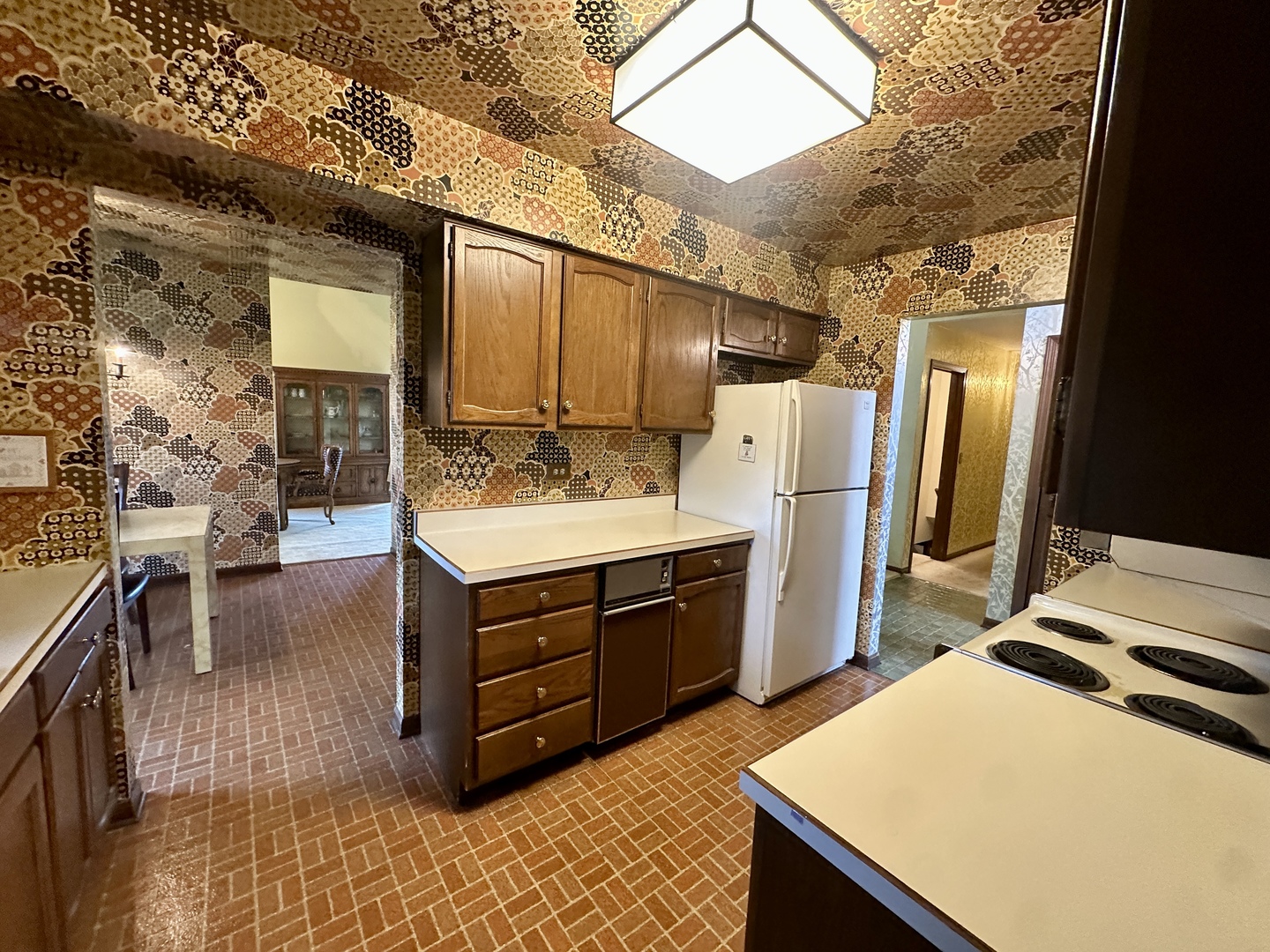 3008 Rennes Court Northbrook, IL 60062 - Photo 4 of 32 a kitchen with a sink appliances and cabinets