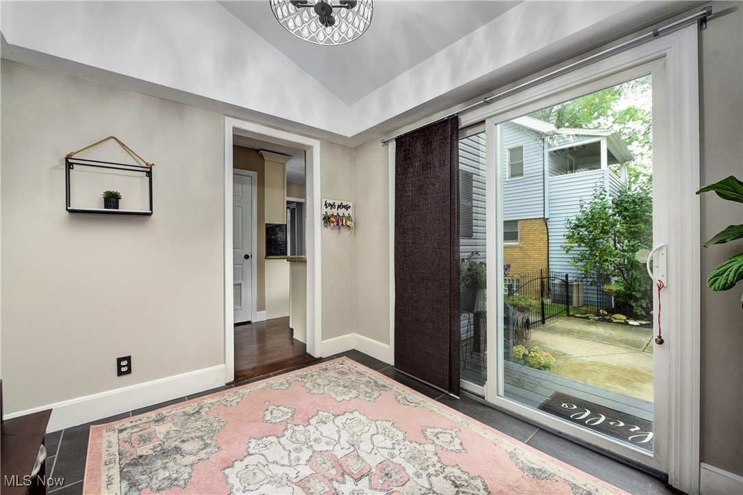 456 Clague Road Bay Village, OH 44140 - Photo 10 of 28 Breezeway/Mud Room with vaulted ceilings and slate flooring.