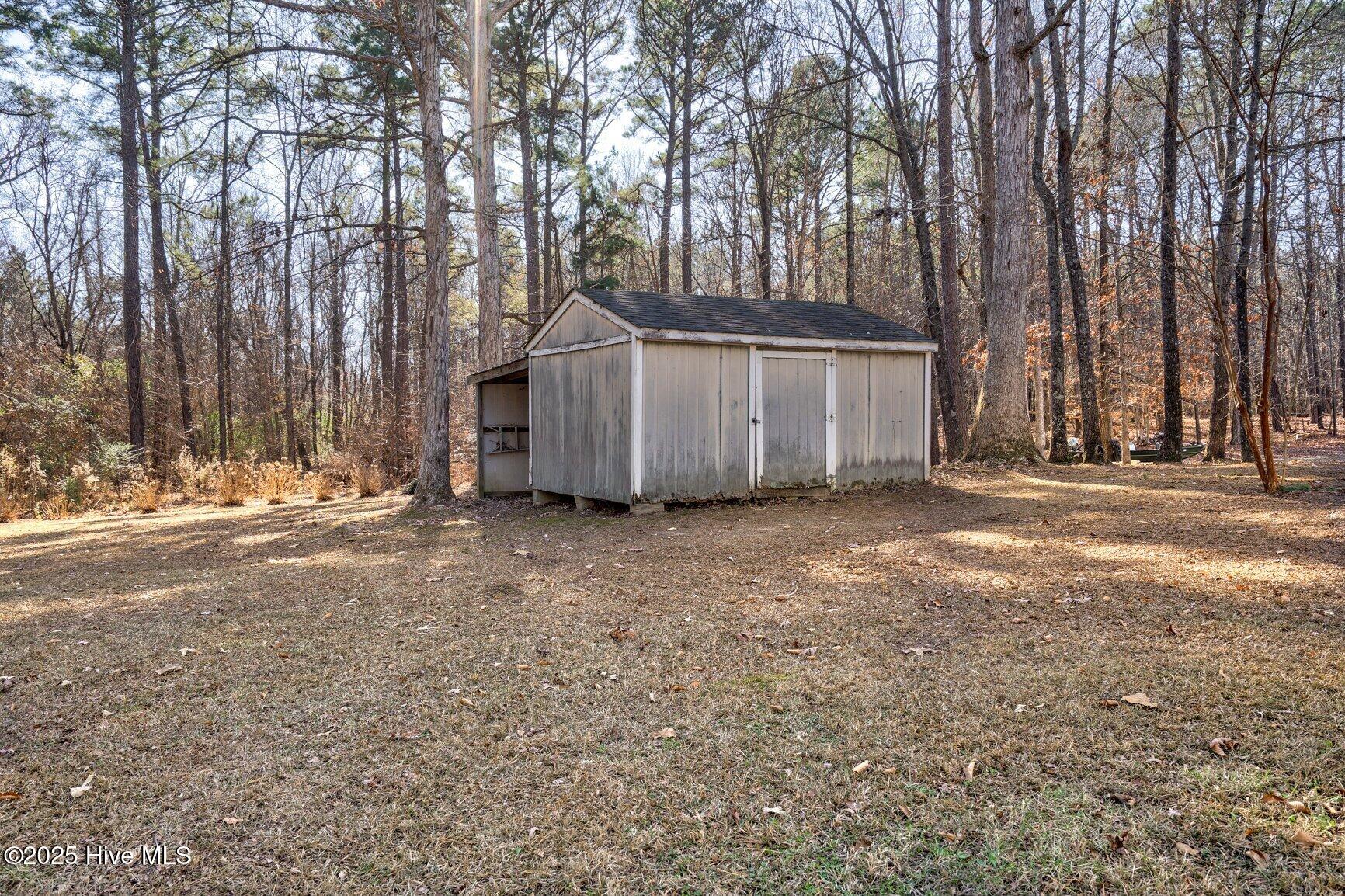 155 Deer Walk Road Tarboro, NC 27886 - Photo 28 of 31 Shed w/ lean to