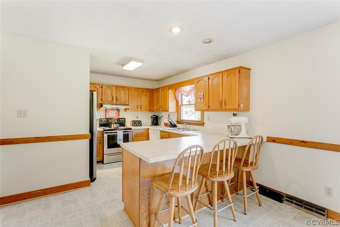 13200 Beach Road Chesterfield, VA 23832 - Photo 3 of 30 a view of a kitchen with furniture and a window