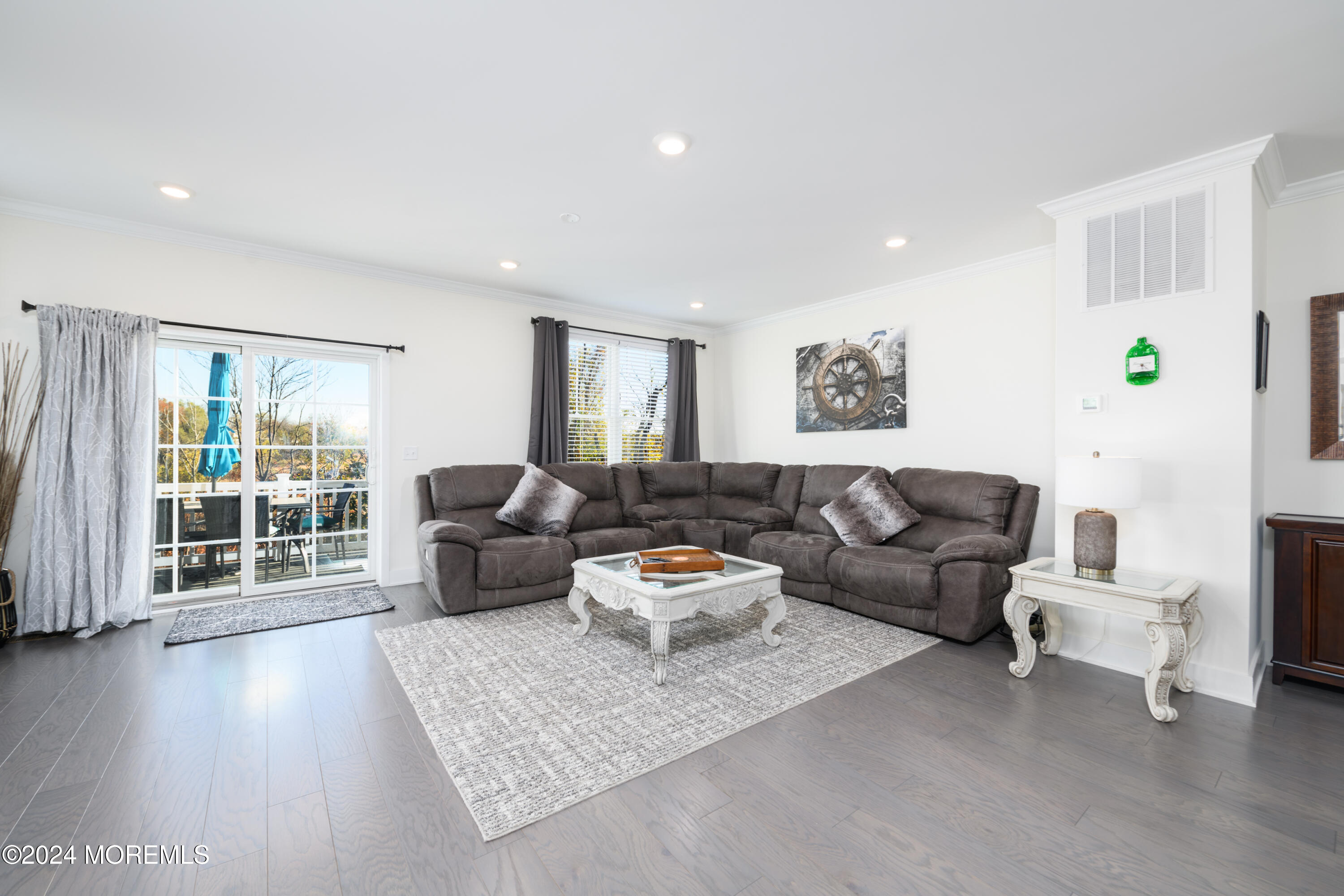 17 Raritan Cove Keyport, NJ 07735 - Photo 3 of 42 a living room with furniture and a large window
