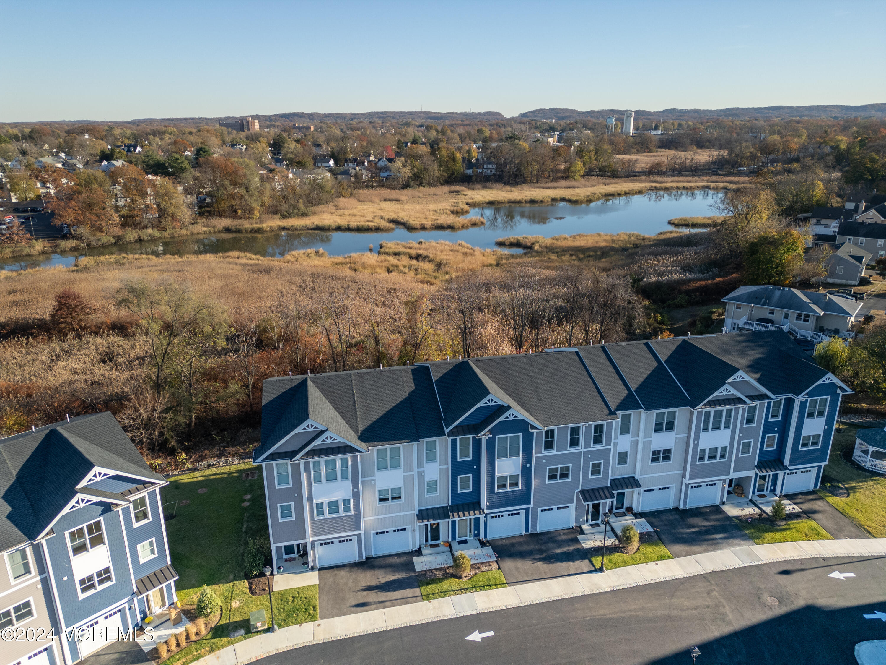 17 Raritan Cove Keyport, NJ 07735 - Photo 31 of 42 an aerial view of a house with swimming pool and mountains