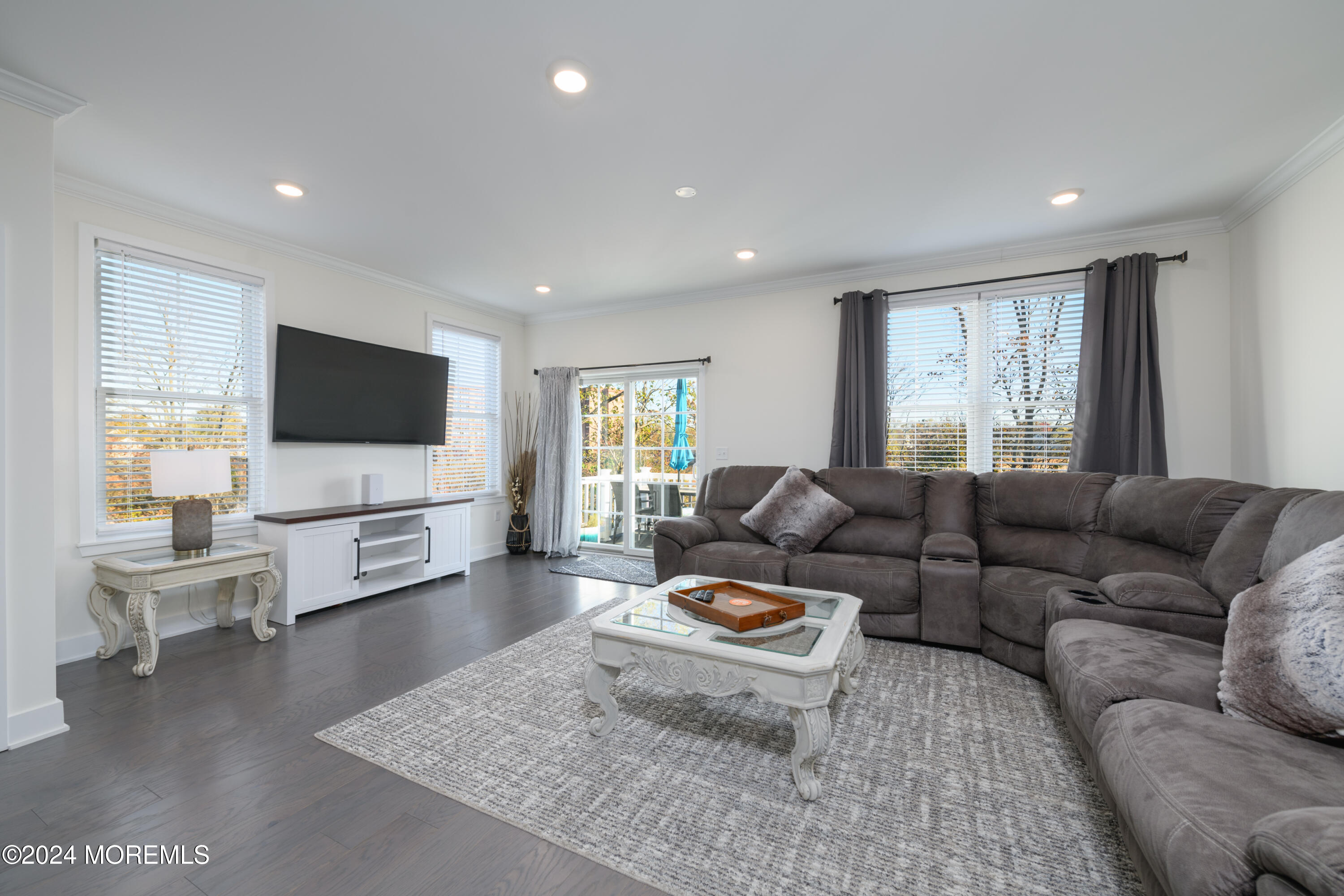 17 Raritan Cove Keyport, NJ 07735 - Photo 4 of 42 a living room with furniture and a flat screen tv