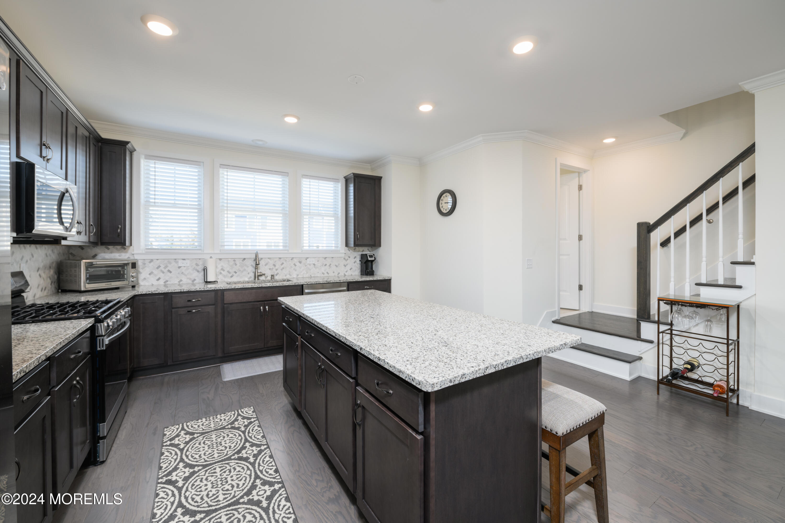17 Raritan Cove Keyport, NJ 07735 - Photo 9 of 42 a kitchen with a sink stove and cabinets