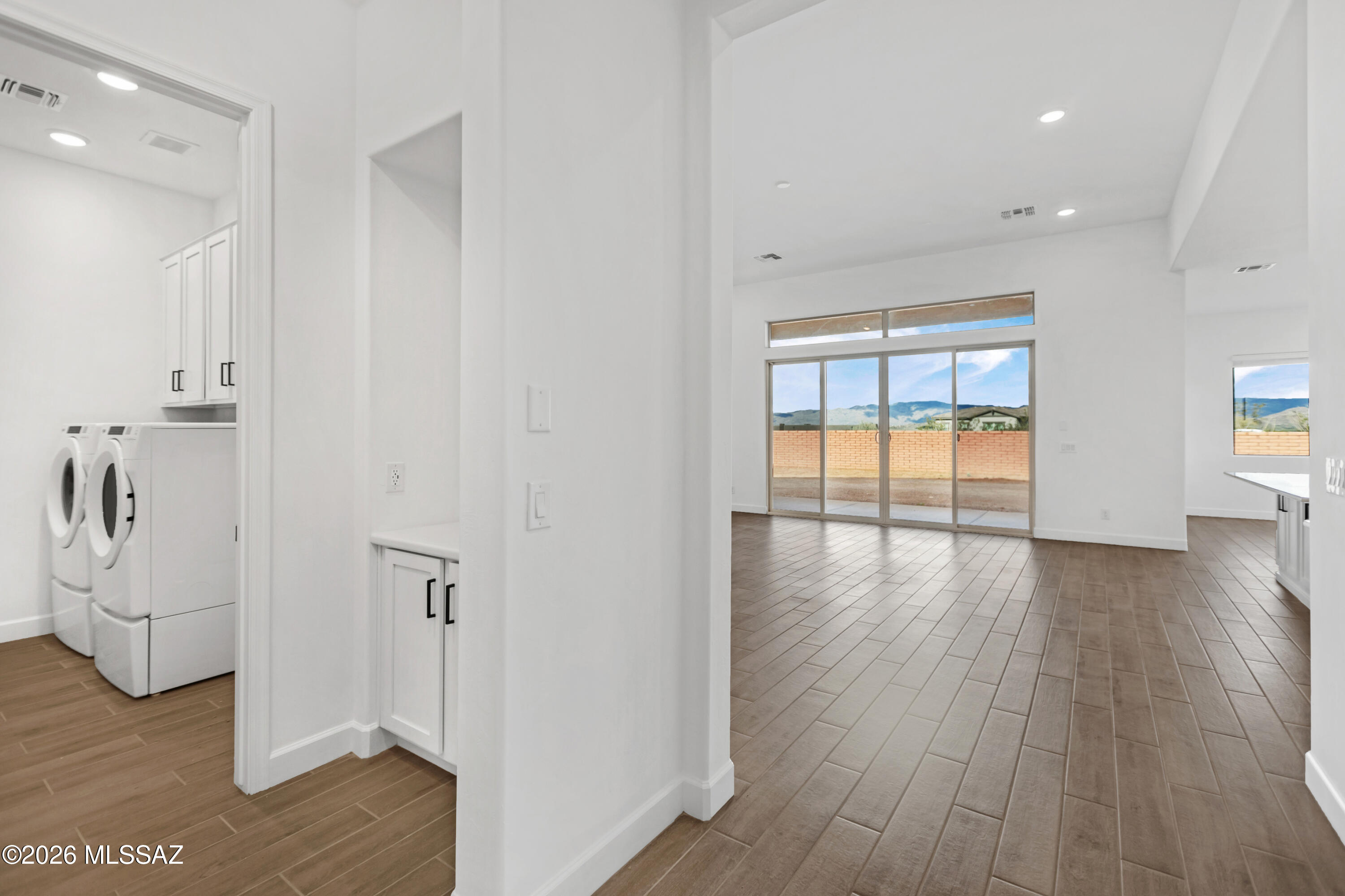 14736 East Sands Ranch Road Vail, AZ 85641 - Photo 12 of 20 wooden floor in an empty room with a window