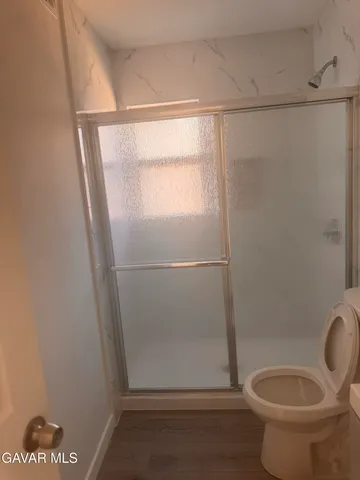 a bathroom with a sink and toilet