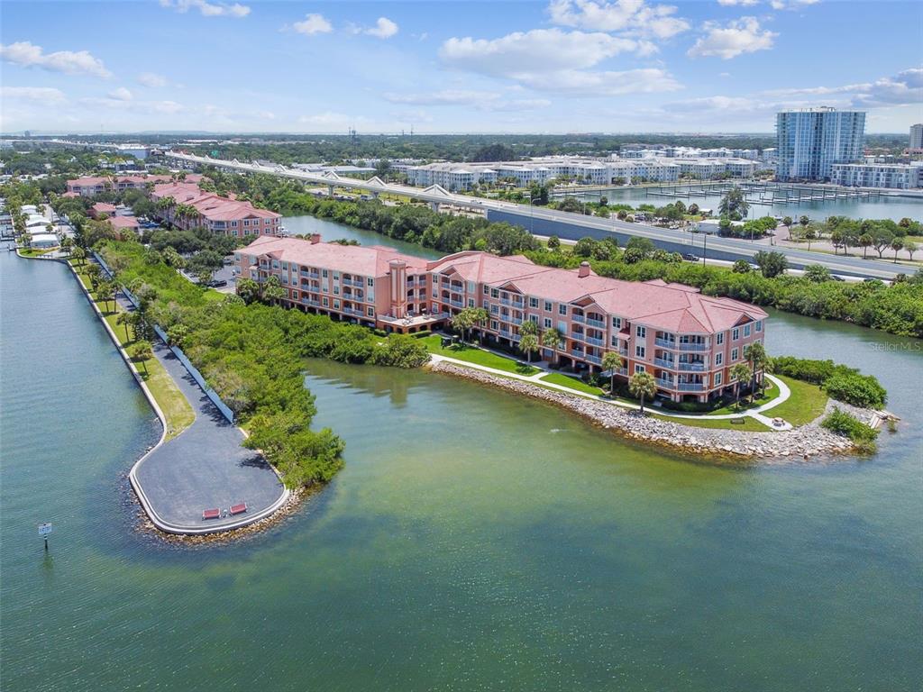 5000 Culbreath Key Way, Unit 1215 Tampa, FL 33611 - Photo 48 of 57 an aerial view of a house with a garden and lake view