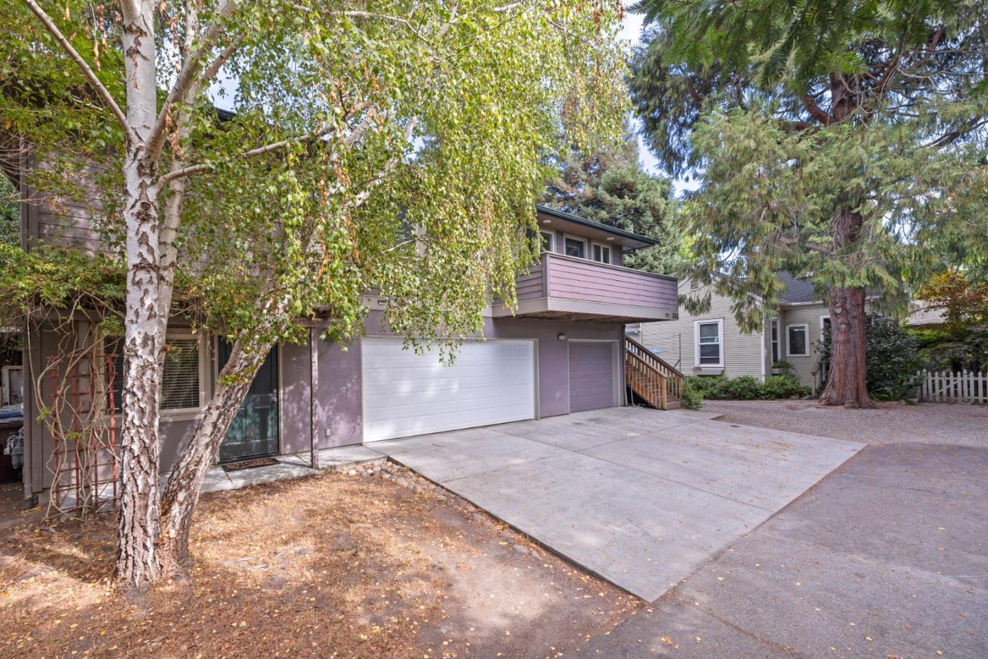 33 Edgewood Way Santa Cruz, CA 95060 - Photo 2 of 37 a front view of a house with a yard and garage