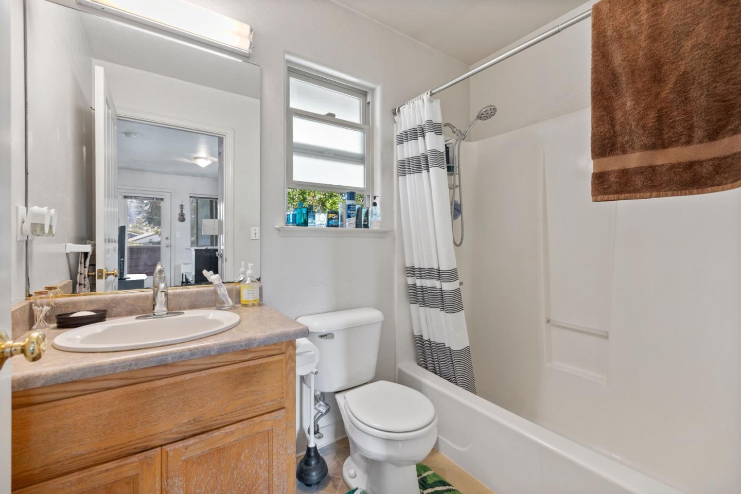 33 Edgewood Way Santa Cruz, CA 95060 - Photo 29 of 37 a bathroom with a sink toilet and shower