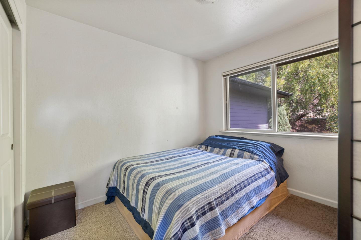33 Edgewood Way Santa Cruz, CA 95060 - Photo 33 of 37 a bedroom with a bed and a large window