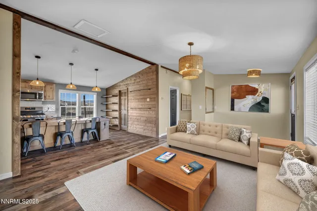 a kitchen with stainless steel appliances granite countertop a stove and a refrigerator