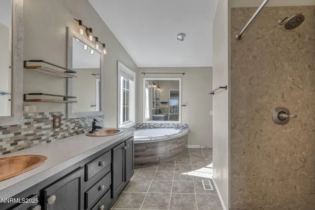 a view of a kitchen cabinets and a window