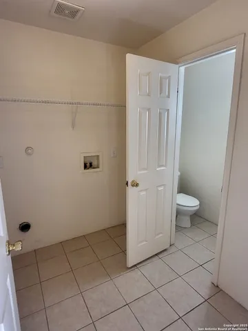 a bathroom with a toilet