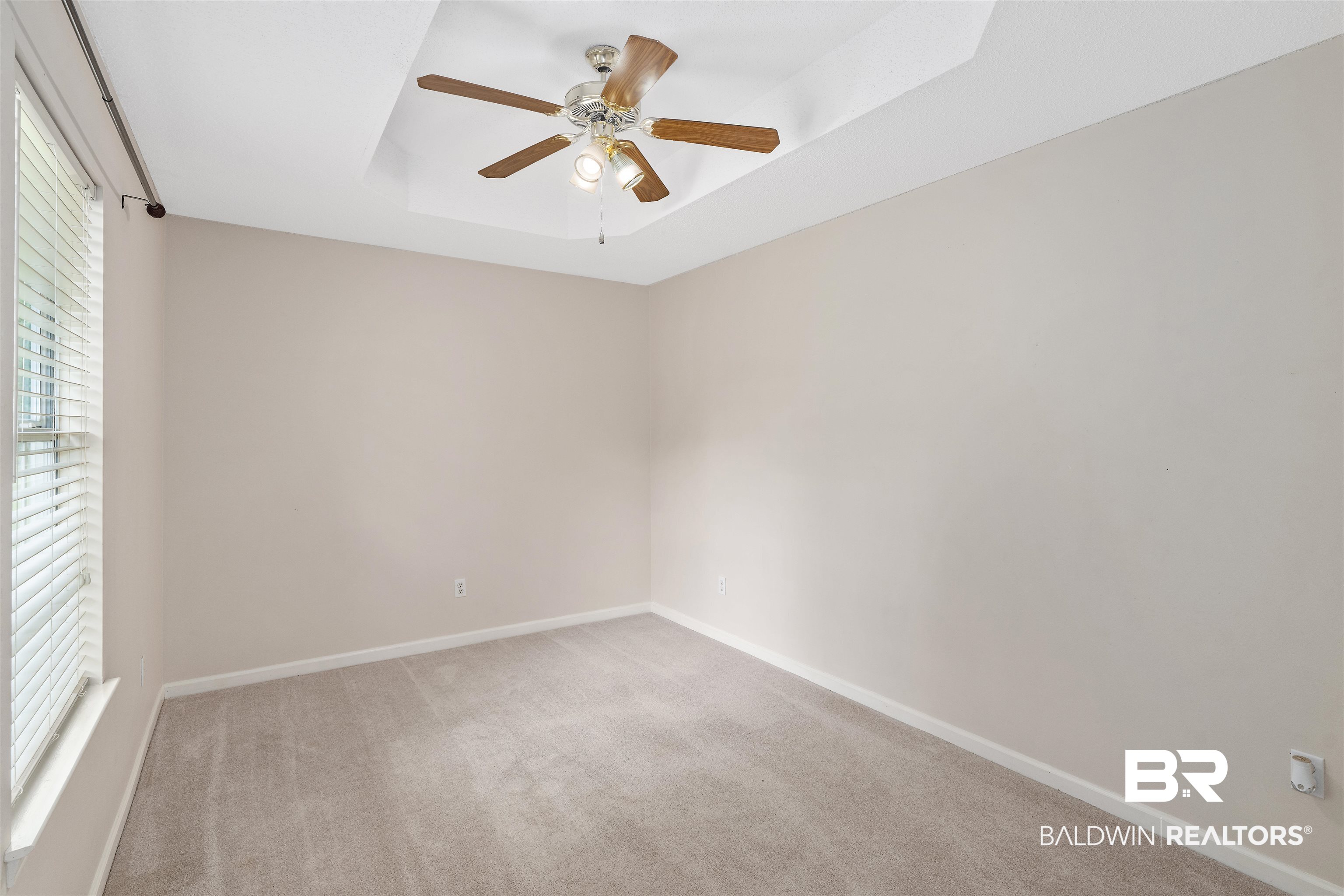 25779 Austin Road Daphne, AL 36526 - Photo 18 of 30 Carpeted empty room with ceiling fan and baseboards