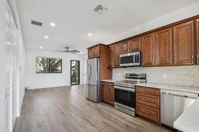 a view of a livingroom with furniture