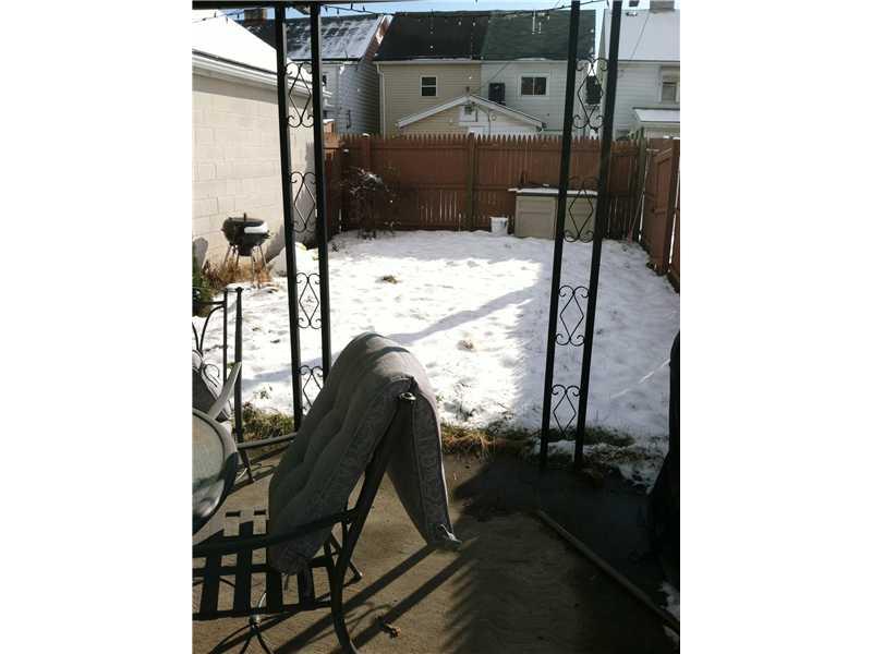 103 Orchard Street McKees Rocks, PA 15136 - Photo 8 of 12 Exterior Back. Fenced in backyard plus covered patio area