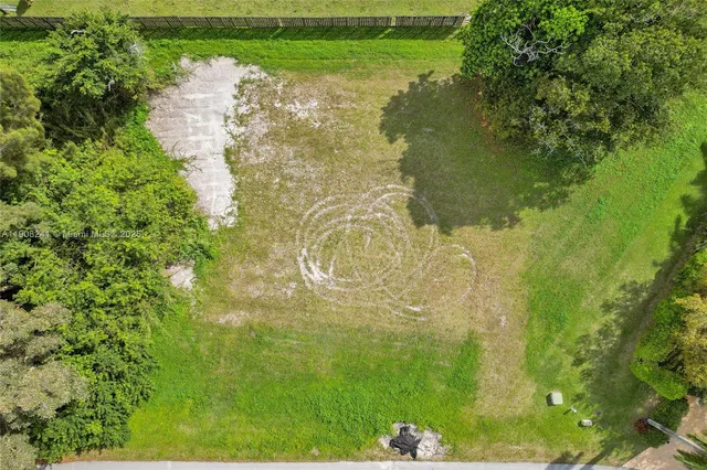 a view of a lake with a yard